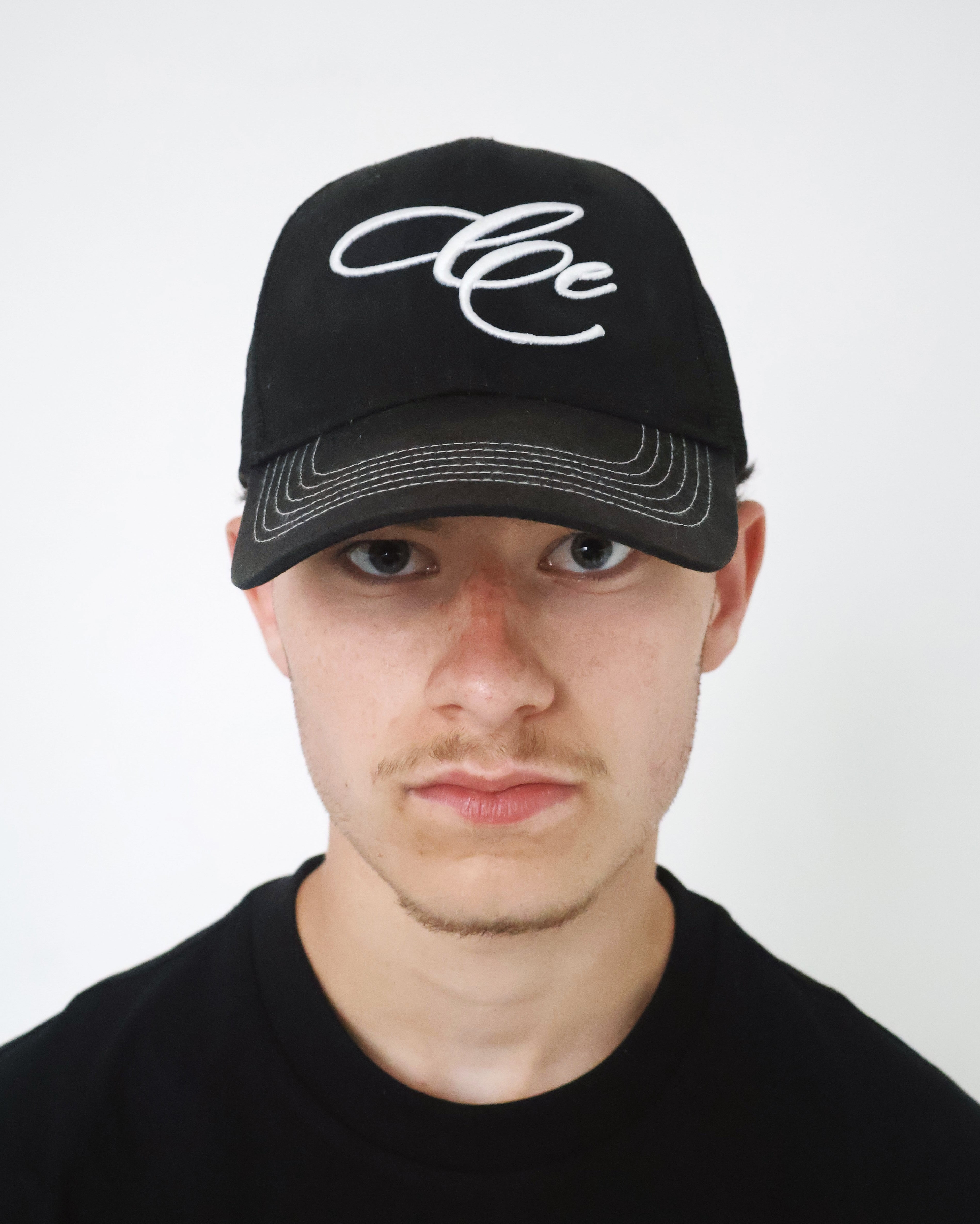 The Black Trucker Cap